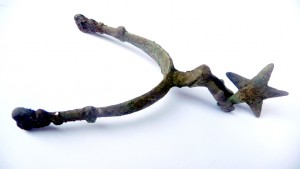 A seventeenth-century spur with a star-shaped rowel - found during this year's training excavation.