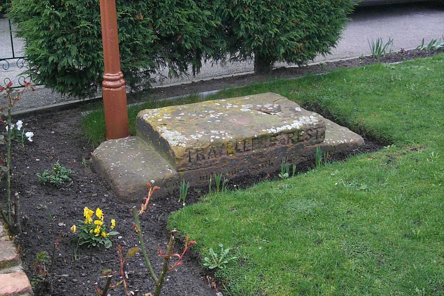 Stone block inscribed TRAVELLERS REST